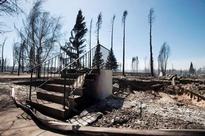 'Crushing consequences': experts see growing risk as wildfires crash into communities