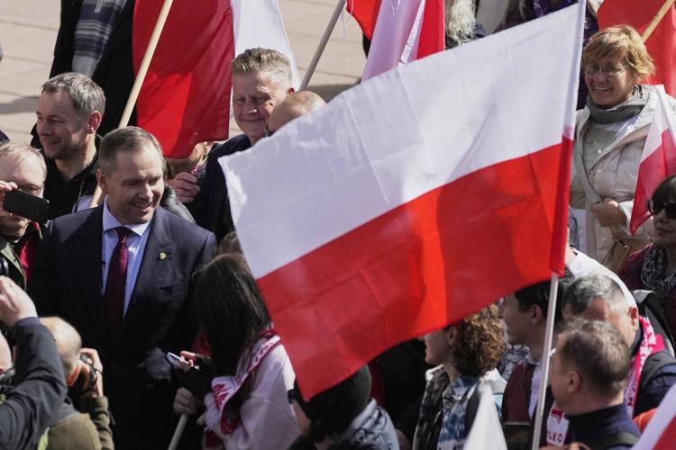 Poles celebrate coronation of 1st king at march supporting conservative presidential candidate