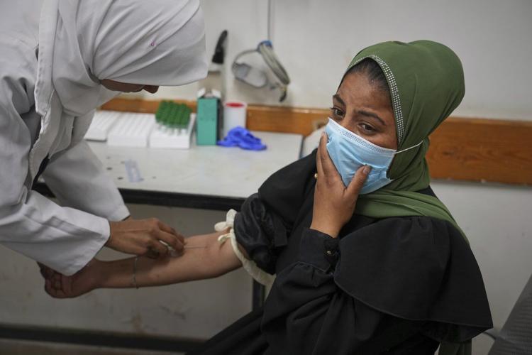 A pregnant woman under Israel's blockade in Gaza's ruins fears for her baby