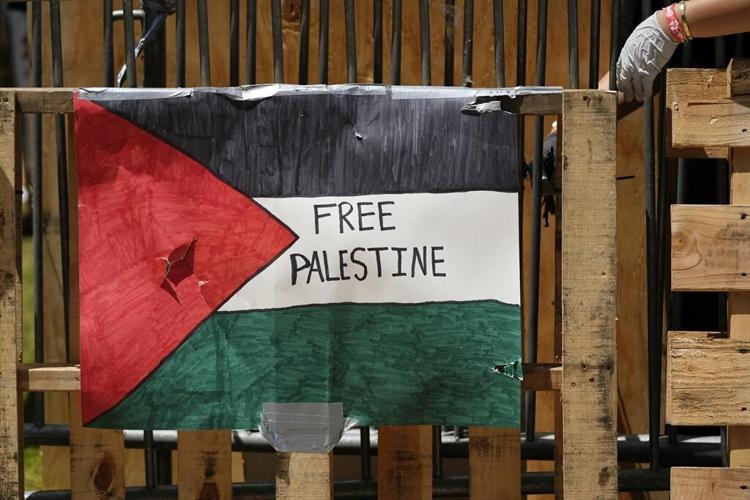 Biden keeps quiet as Gaza protesters and police clash on college campuses