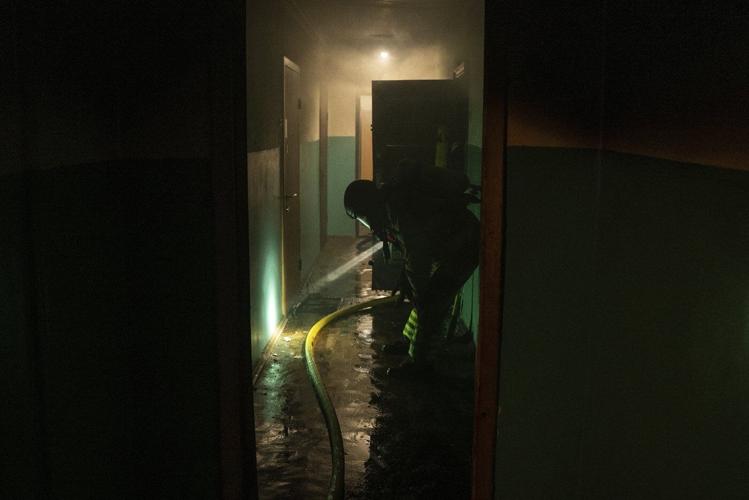 AP PHOTOS: Kyiv comes under large-scale Russian drone and missile attack