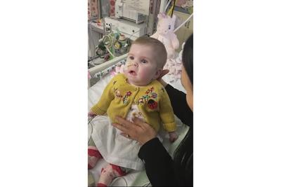 UK judge decries legal tactics used by sick child's parents as he refuses to let her die at home