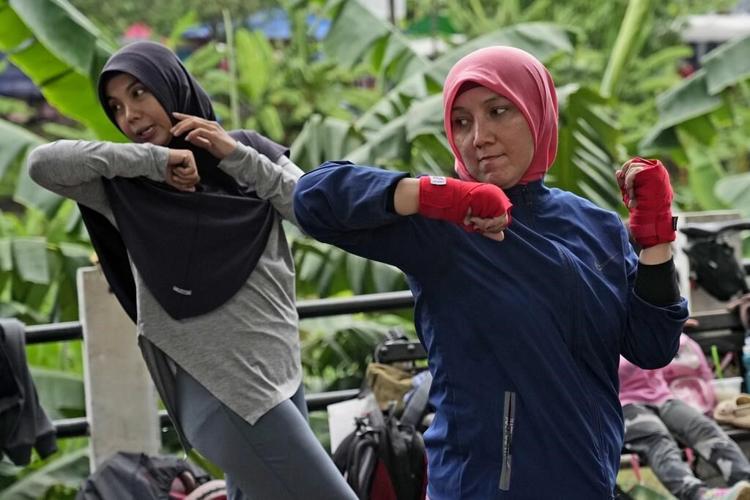 Indonesian women assert themselves with martial arts as gender-based violence remains a challenge