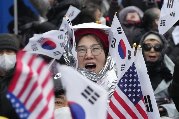 South Korean anti-corruption agency and police debate tougher measures to detain impeached president