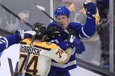 Jeremy Swayman makes 28 saves, Bruins beat weary Maple Leafs 4-1 for 20th home victory