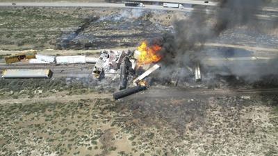 Interstate near Arizona-New Mexico line reopens after train derailment as lingering fuel burns off