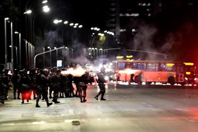 Bolsonaro supporters clash with police in Brazil's capital