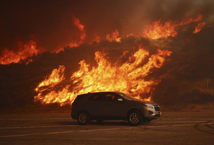 20,000 ordered to evacuate as fast-moving wildfire imperils homes north of Los Angeles