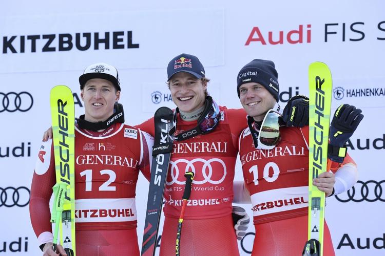 Swiss skier Marco Odermatt takes eventful World Cup super-G for 1st win in Kitzbuehel