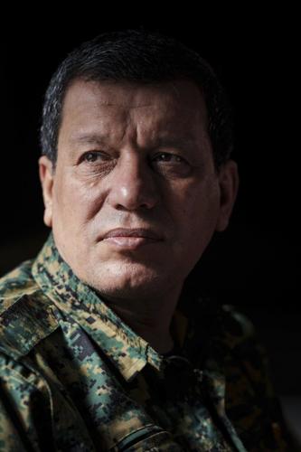 US-backed commander says his Kurdish-led group wants a secular and civil state in post-Assad Syria