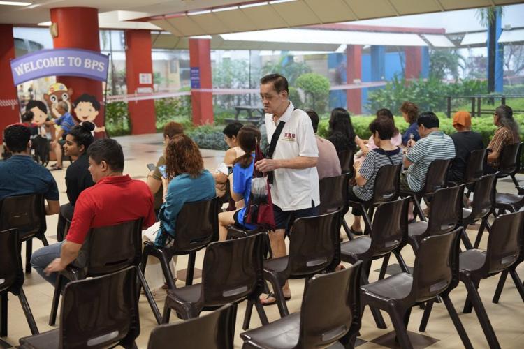 Voting underway in Singapore as its long-ruling party seeks a bigger win