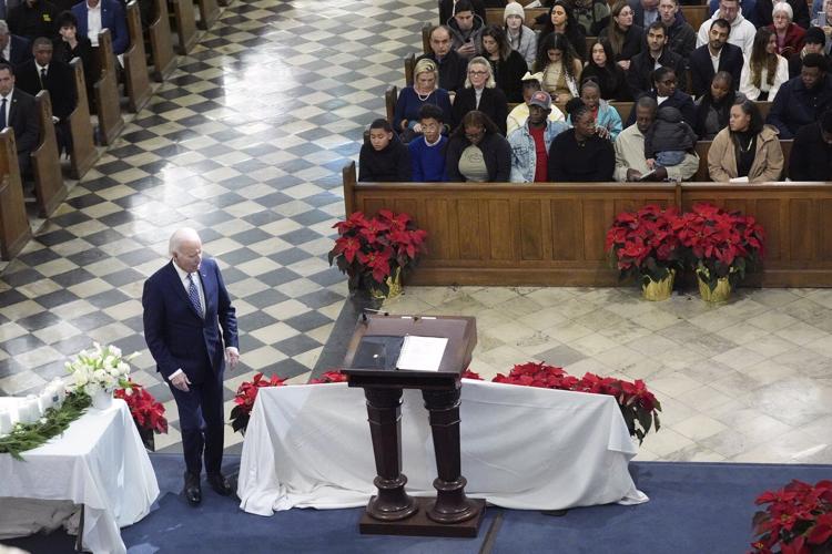 Biden tells New Orleans mourners they are not alone as he honors victims of attack