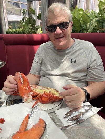 Claws come out for federal minister who shared picture of lobster lunch in Asia