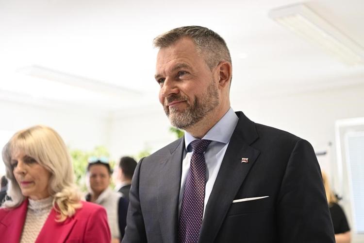 Pro-Western diplomat faces an ally of populist premier in a race for Slovakia's presidency