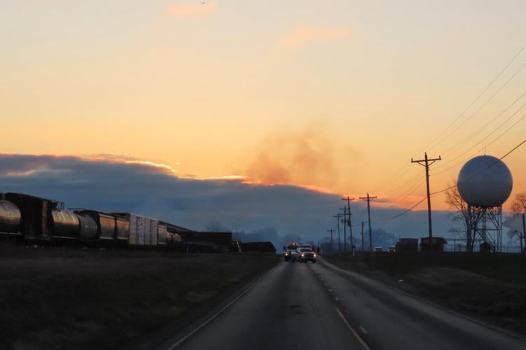 Derailed train in Kentucky causes a chemical leak and sparks a fire