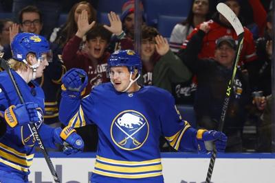 Horvat leads Canucks in 5-4 win over Sabres