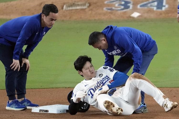 Shohei Ohtani partially dislocates left shoulder during World Series Game 2, status TBD