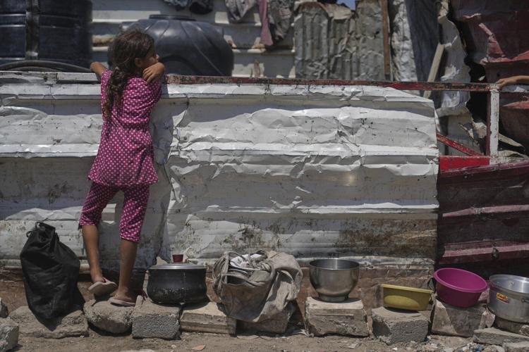 UN food agency chief says women and children are starving in Gaza and pressed Netanyahu on aid