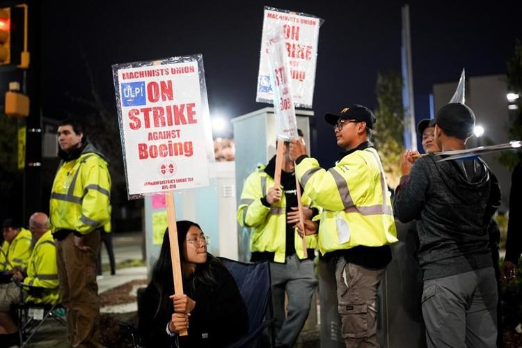 Boeing factory workers go on strike after rejecting contract offer