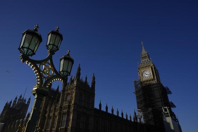 UK resists calls to label China a threat following claims a Beijing spy worked in Parliament