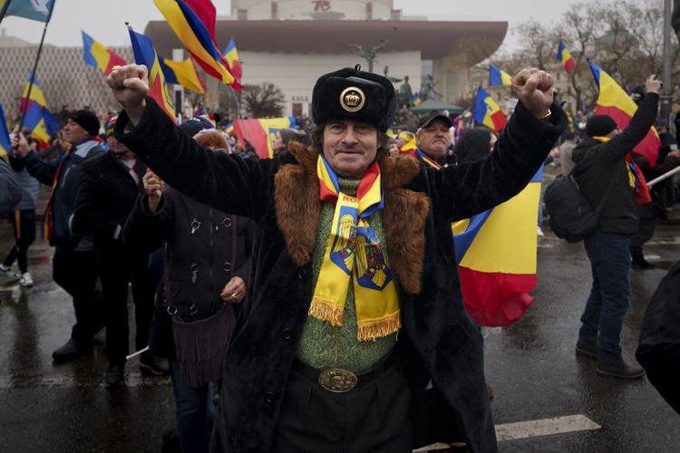 Tens of thousands of anti-government protesters hold rally ahead of Romania's election rerun