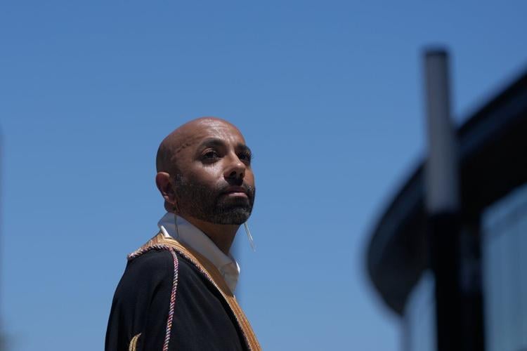 In a rainbow-trimmed robe at the World Cup, a gay Qatari doctor advocates for equal rights
