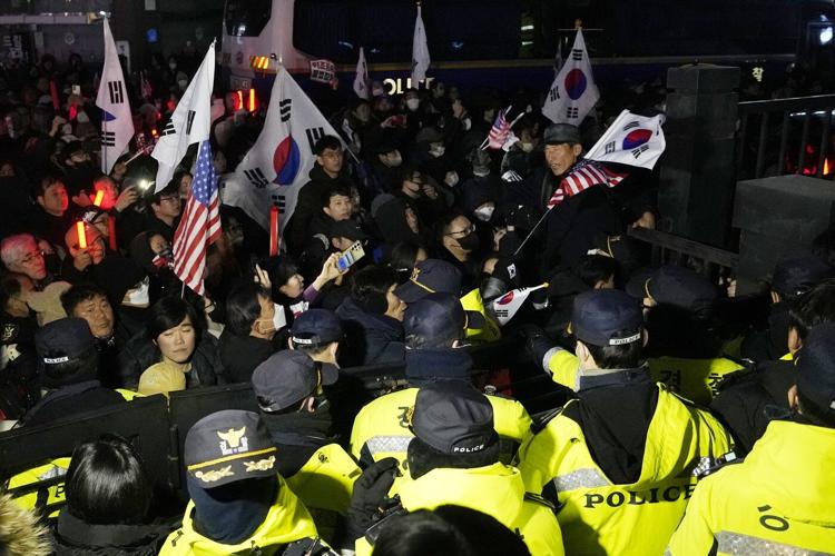 South Korea's impeached president is arrested over martial law declaration and his supporters riot