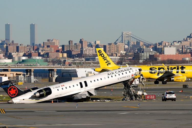 U.S. safety board says warning system didn't sound alarm before LaGuardia crash