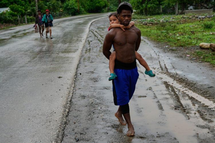 The Latest: Hundreds of thousands evacuate as Hurricane Melissa hits eastern Cuba