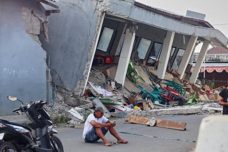 Rescuers in Indonesia recover 6 more bodies in earthquake aftermath, raising death toll to 53