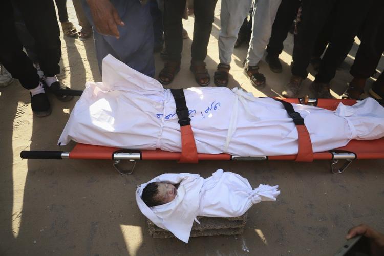 Israeli fire kills dozens in Gaza, officials say, as aid delivery remains chaotic after new measures
