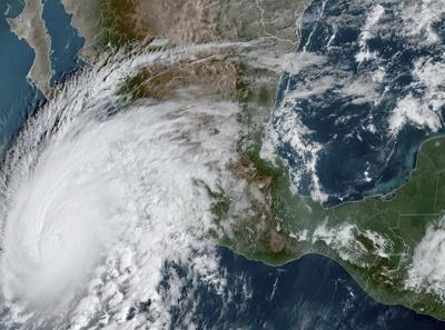 Hurricane Norma takes aim at Mexico's Los Cabos resorts, as Tammy threatens islands in the Atlantic