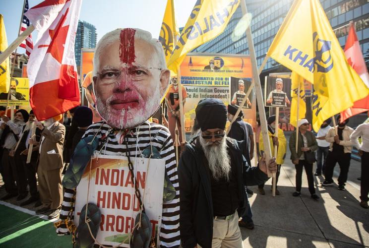Activists rally in Calgary during G7 summit to protest India PM Modi