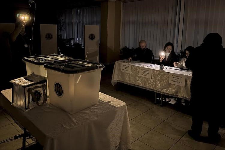 Moldovans cast votes to choose president and decide on EU path as Russian interference claims spike