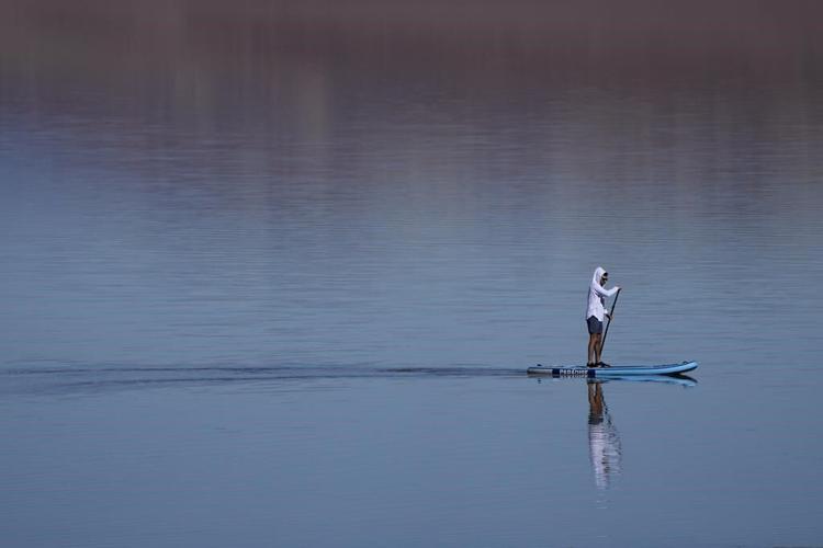 Kayakers paddle in Death Valley after rains replenish lake in one of Earth's driest spots