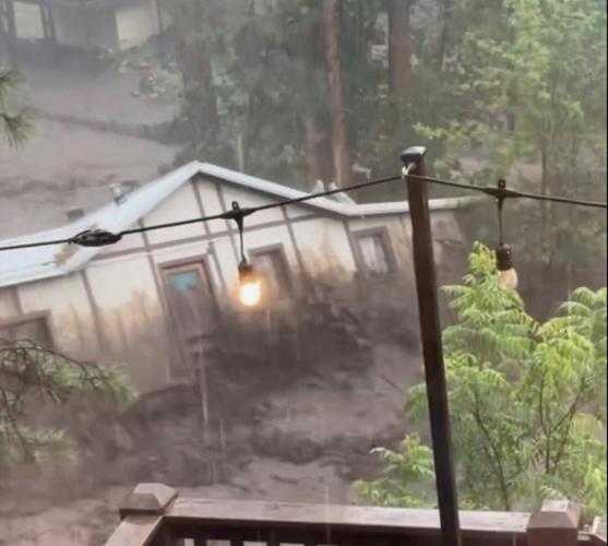 An entire house swept downstream in New Mexico floods seen as a symbol of the devastation