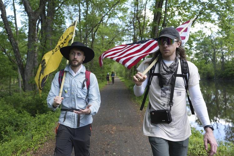 Quakers march against Trump’s crackdown on immigrants carrying on their long faith tradition