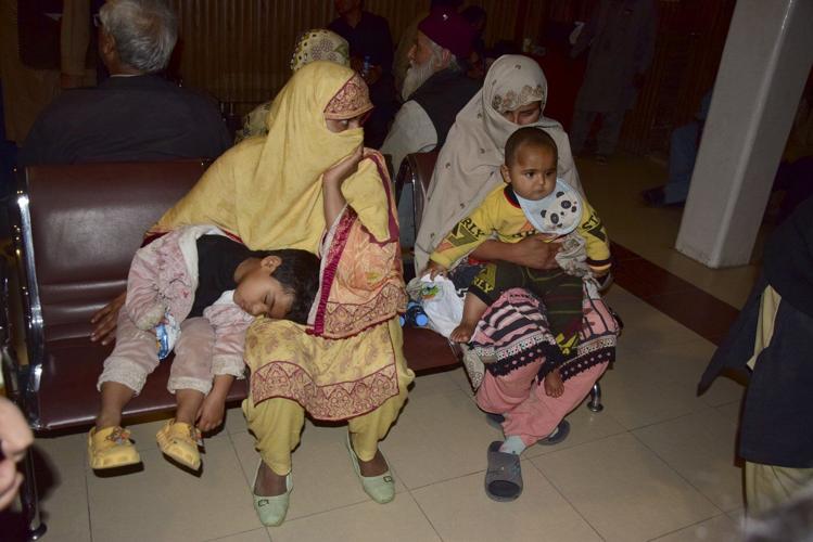 Pakistani insurgents attack a train carrying hundreds of people and take hostages
