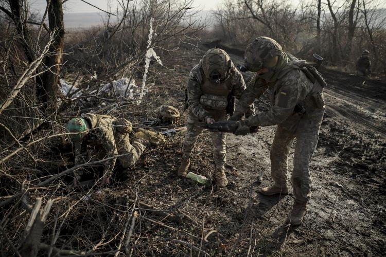 Russian forces bypass a key stronghold in a bid to cut off its supplies, a Ukrainian officer says