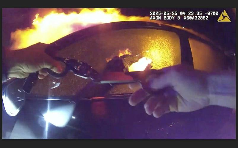 Officer rescues woman from burning car in aftermath of interstate crash in Phoenix