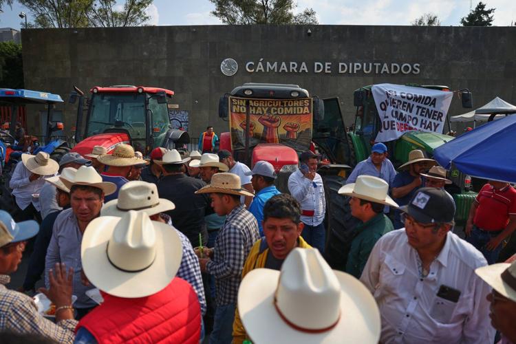 Farmers block Mexico's Congress with tractors in protest against new national water law proposal