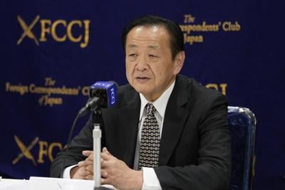 Freed Japan-China friendship group head says charges false