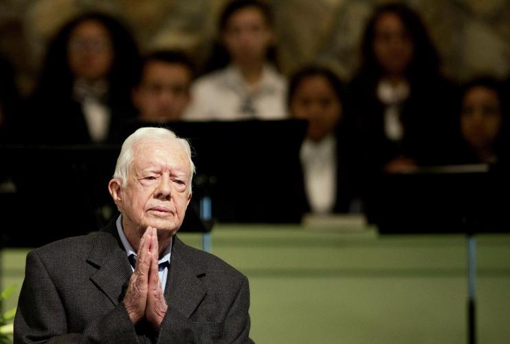 Jimmy Carter's funeral begins by tracing 100 years from rural Georgia to the world stage