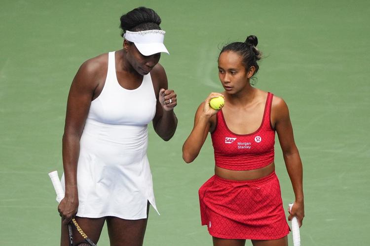 Venus Williams wins a US Open women's doubles match for the first time since 2014