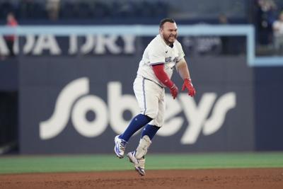 Kirk burns former teammate Romano with walkoff hit as Blue Jays edge Phillies 2-1