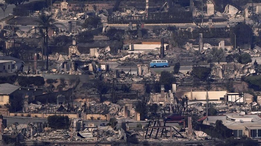 LA area's 2 biggest blazes burn at least 10,000 structures, while new fire leads to more evacuations