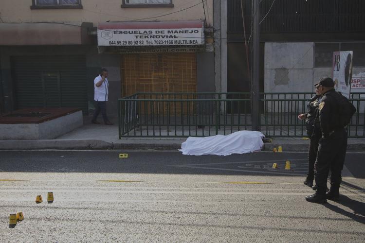 Mexico City mayor says police arrest 13 in connection with killings of her staffers