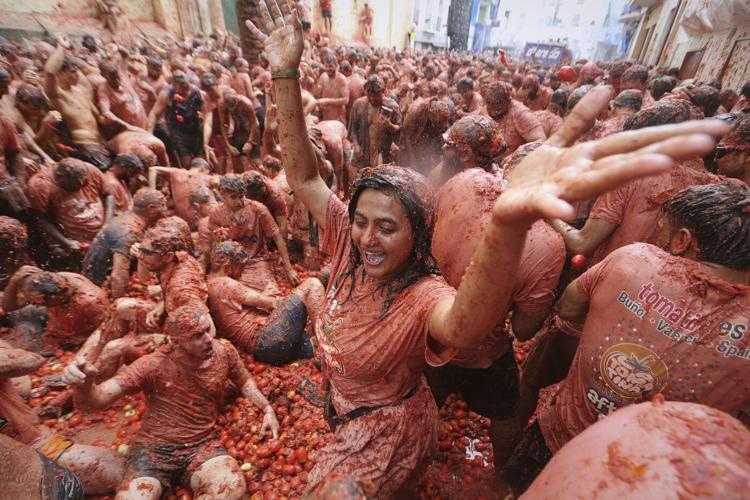 Tons of overripe tomatoes become projectiles in Spain's ‘Tomatina’ food fight