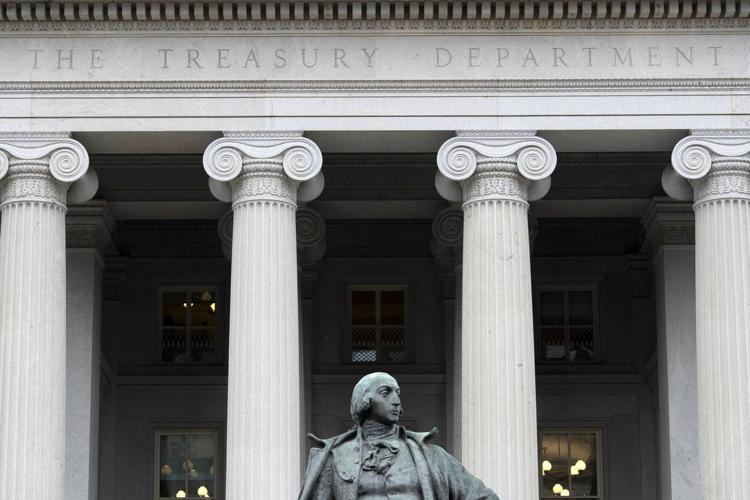 Justice Department's early moves on voting and elections signal a shift from its traditional role