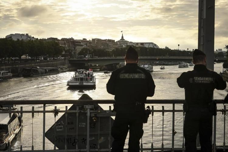 Boats cruise the Seine river in a rehearsal for the Paris Olympics’ opening ceremony
